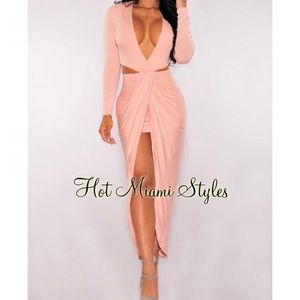 Stretchy, lined cut out draped slit dress